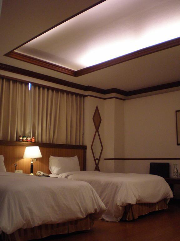 Emperor Hotel Kao-siung Pokoj fotografie