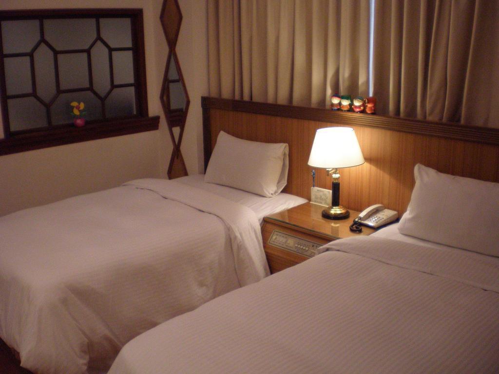 Emperor Hotel Kao-siung Pokoj fotografie
